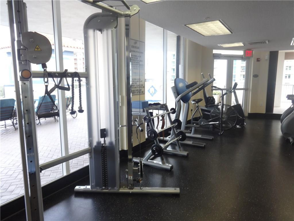 100 South Birch Road, Unit 1106B Fort Lauderdale, FL 33316 - Photo 34 of 34 a view of a room with gym equipment