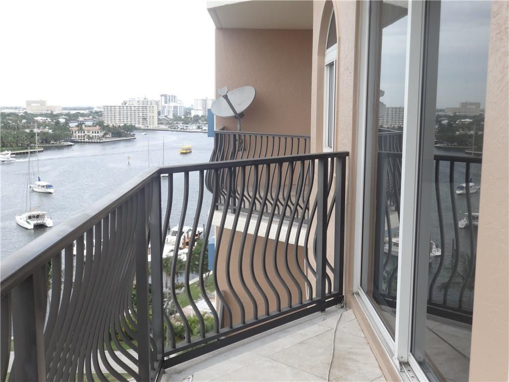 100 South Birch Road, Unit 1106B Fort Lauderdale, FL 33316 - Photo 8 of 34 a view of a balcony with wooden floor