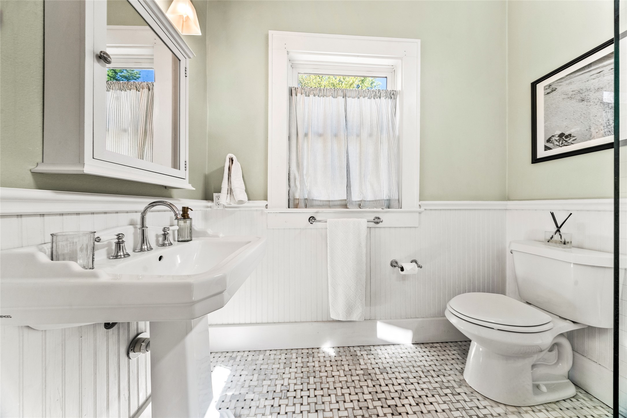 1809 Nickerson Street Austin, TX 78704 - Photo 16 of 31 Bathroom featuring wainscoting and light custom designer tile flooring