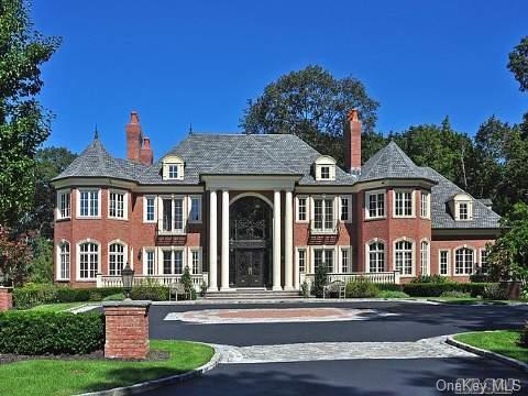 Undisclosed Address St. James, NY 11780 - Photo 1 of 1 a front view of a house with a yard