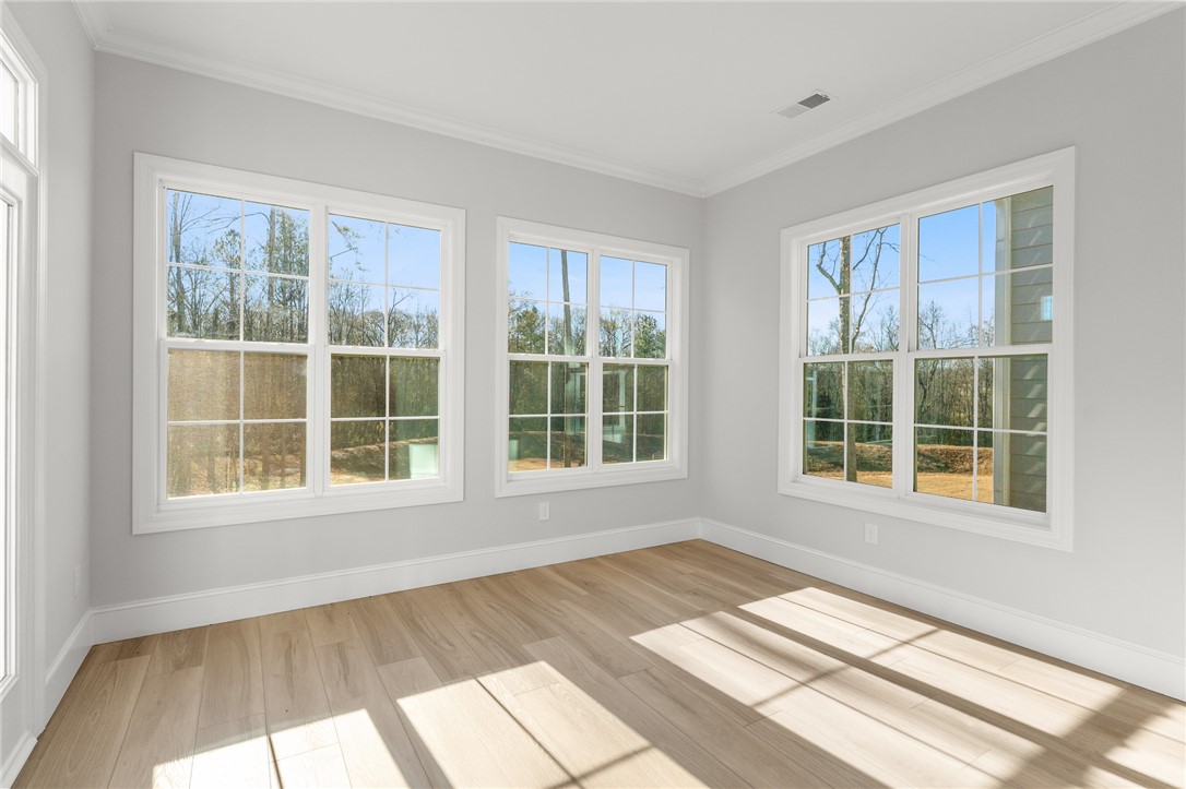 141 Rickys Path Easley, SC 29642 - Photo 16 of 40 Bright and airy interior space with ample natural light, creating a welcoming atmosphere.