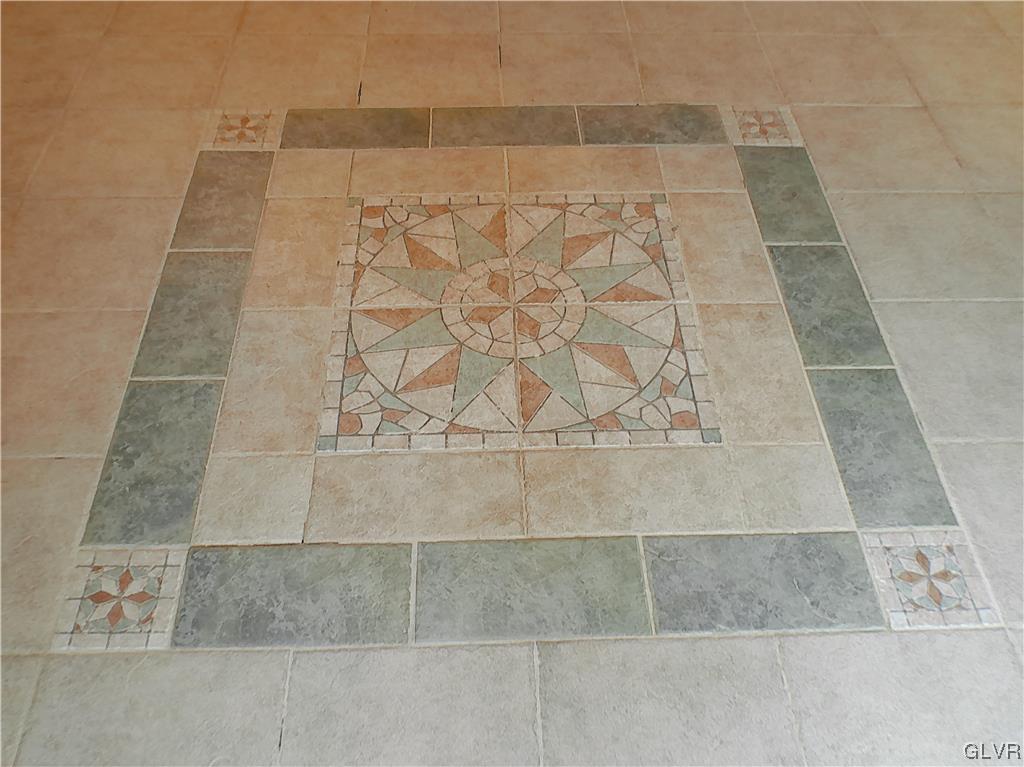 IMPORTED ITALIAN TILE IN FOYER, FAMILY RM, KITCHEN