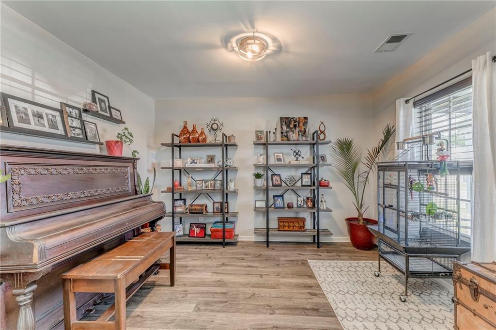 803 Riverside Drive Calhoun, GA 30701 - Photo 26 of 59 a living room with lots of furniture and a rug