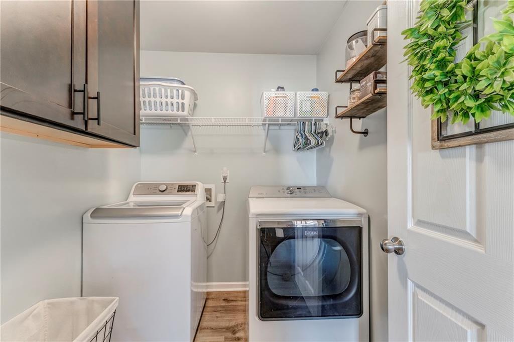 803 Riverside Drive Calhoun, GA 30701 - Photo 45 of 59 a utility room with dryer and washer