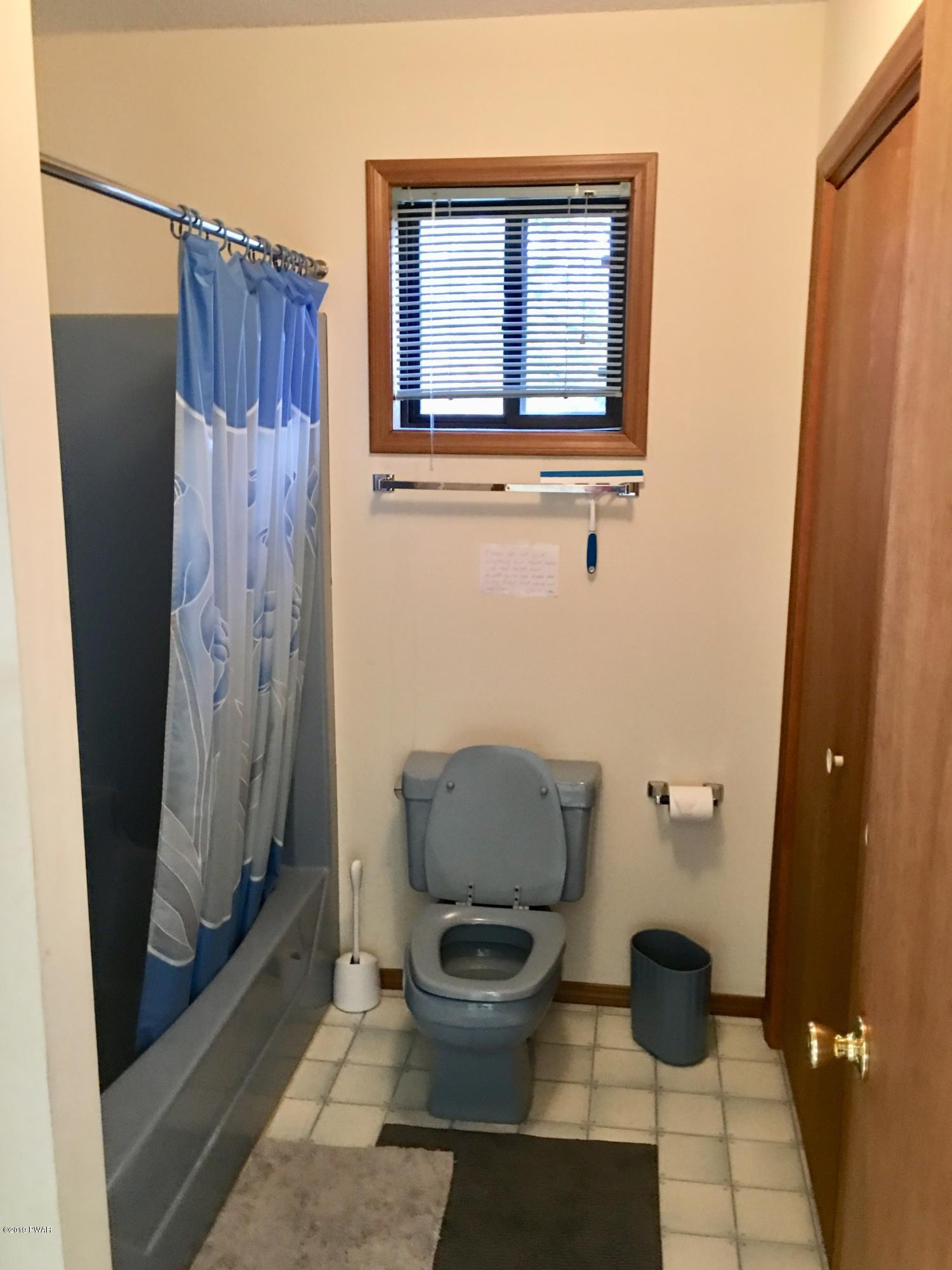 2375 Crest View Road Lake Ariel, PA 18436 - Photo 12 of 30 a bathroom with a toilet and a shower