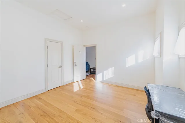 a view of room with wooden floor and chair