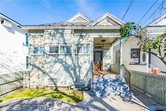a view of multiple house with a swimming pool
