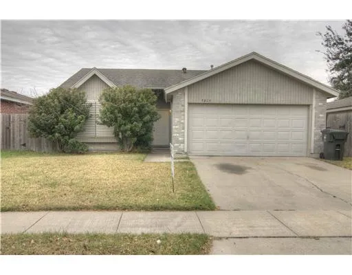 a small white house with a outdoor space