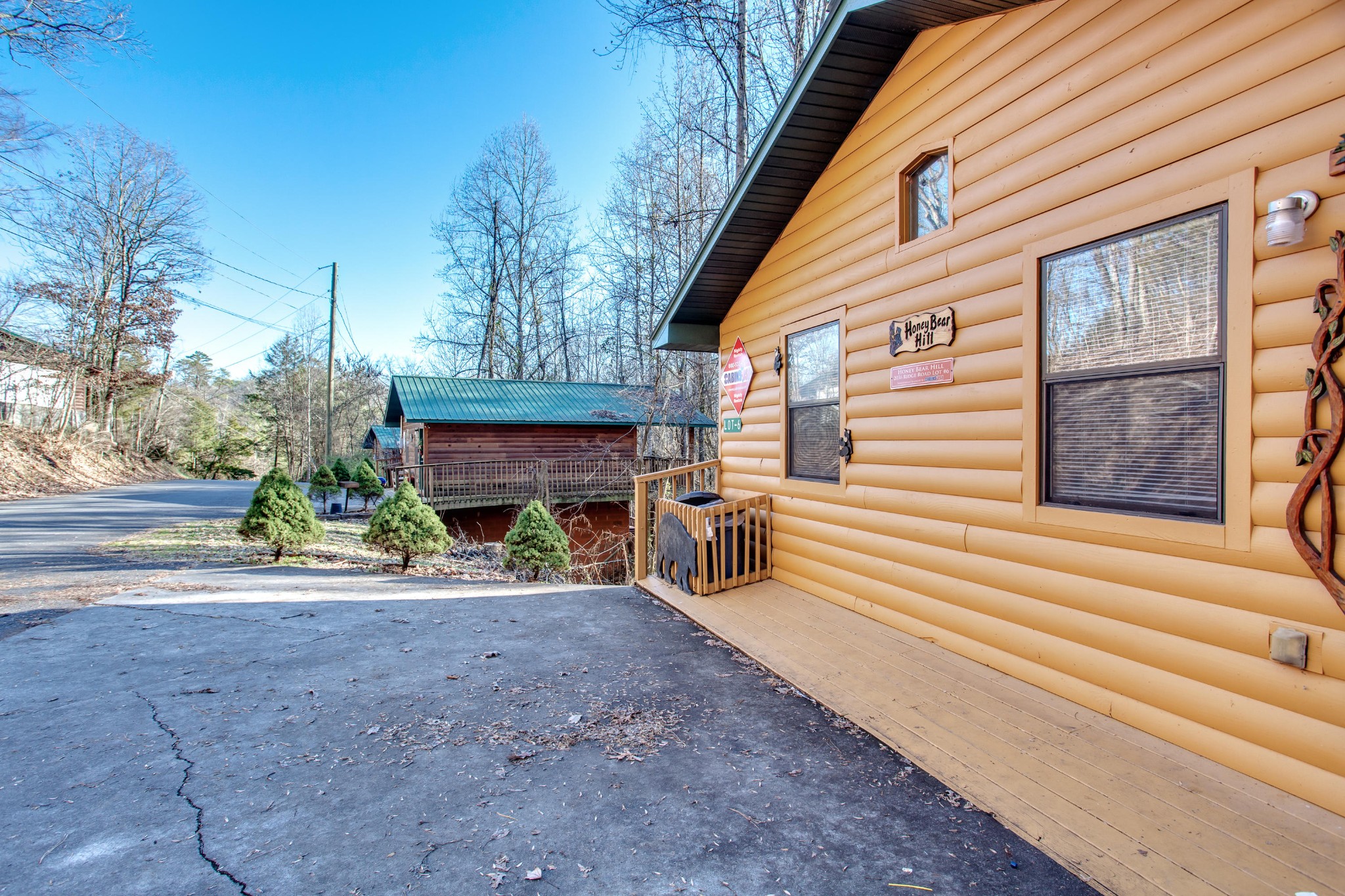 2036 Ridge Road, Unit SUITE 6 Pigeon Forge, TN 37863 - Photo 29 of 29 a view of a house with a yard and garage