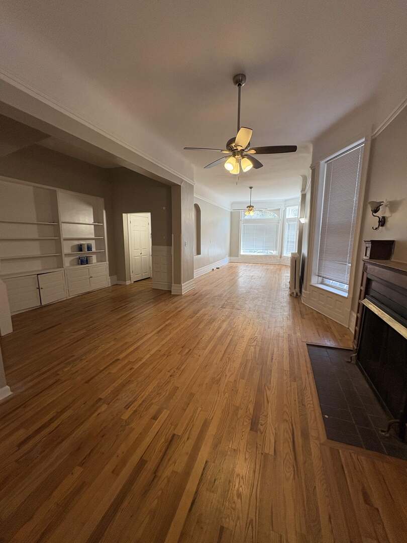 5136 South Blackstone Avenue, Unit 1F Chicago, IL 60615 - Photo 4 of 13 a view of a kitchen with wooden floor and a kitchen