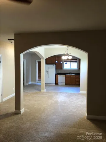 a view of a big room with a fireplace