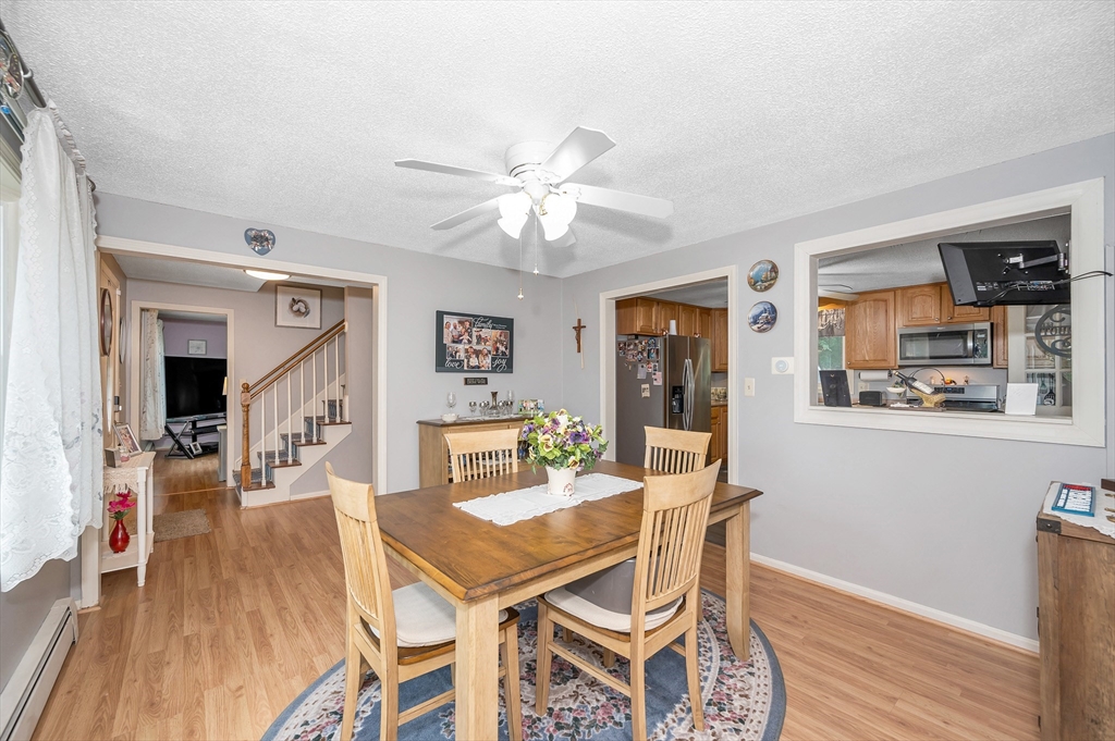 30 Partridge Road Dracut, MA 01826 - Photo 14 of 39 a dining room with furniture and window