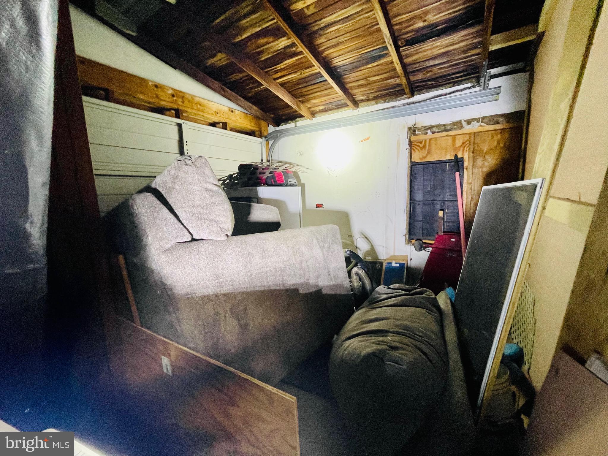 2408 Noble Street Reading, PA 19609 - Photo 28 of 31 a bed sitting in a bedroom next to a window