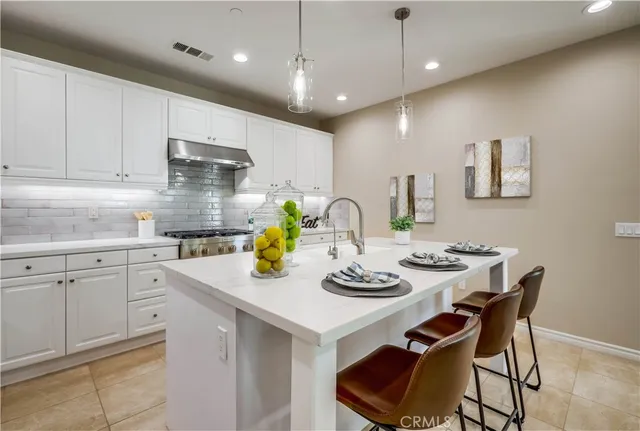 a workspace with furniture and a window