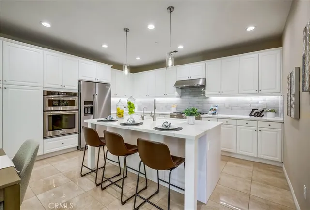 a bathroom with a sink toilet and mirror