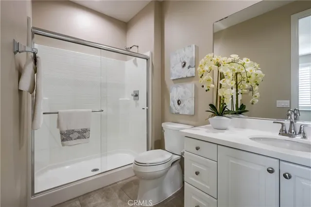 a bath tub sitting in a bathroom next to a window