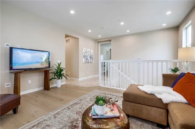 a white toilet sitting next to a shower curtain