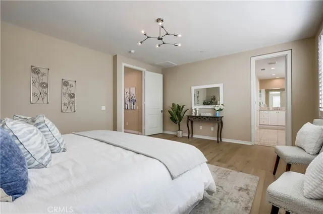 a view of a chairs with flower in front of house