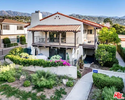 a front view of a house with a porch