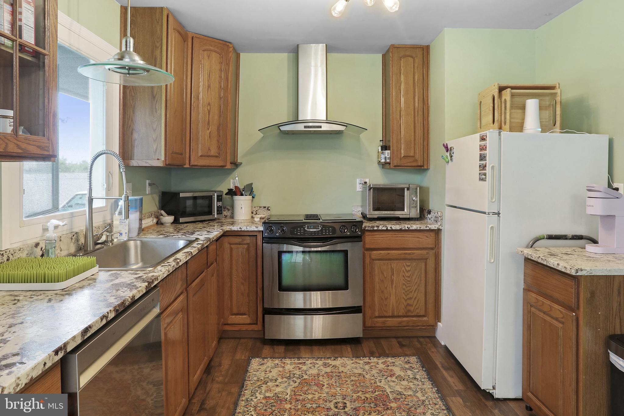 402 Williamsburg Road Sterling, VA 20164 - Photo 15 of 28 Updated Kitchen with vent hood.