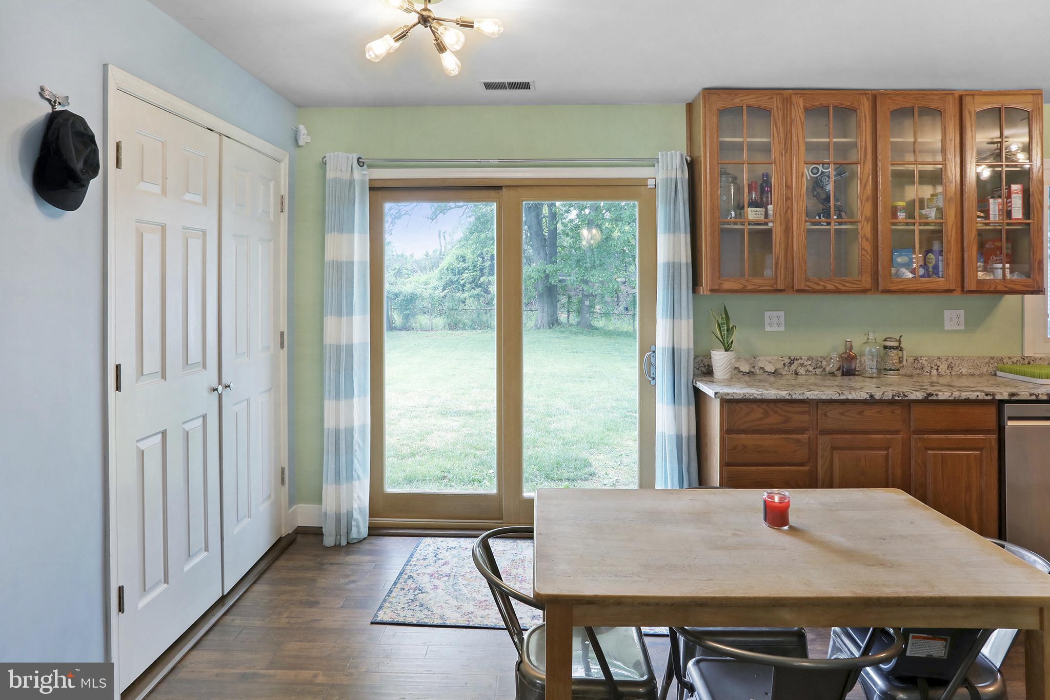 402 Williamsburg Road Sterling, VA 20164 - Photo 18 of 28 Door to outside with a huge back yard