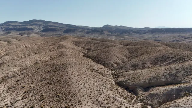 a view of lake and mountain