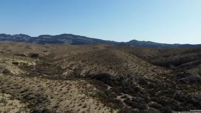 a view of a house with a mountain