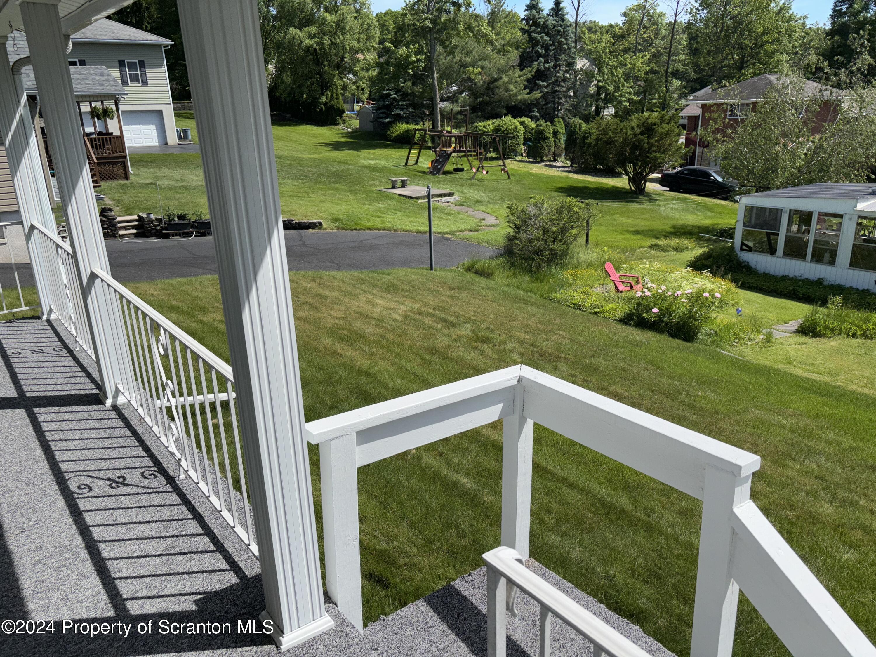 1402 Cherry Street Scranton, PA 18505 - Photo 19 of 25 a view of a backyard with sitting area