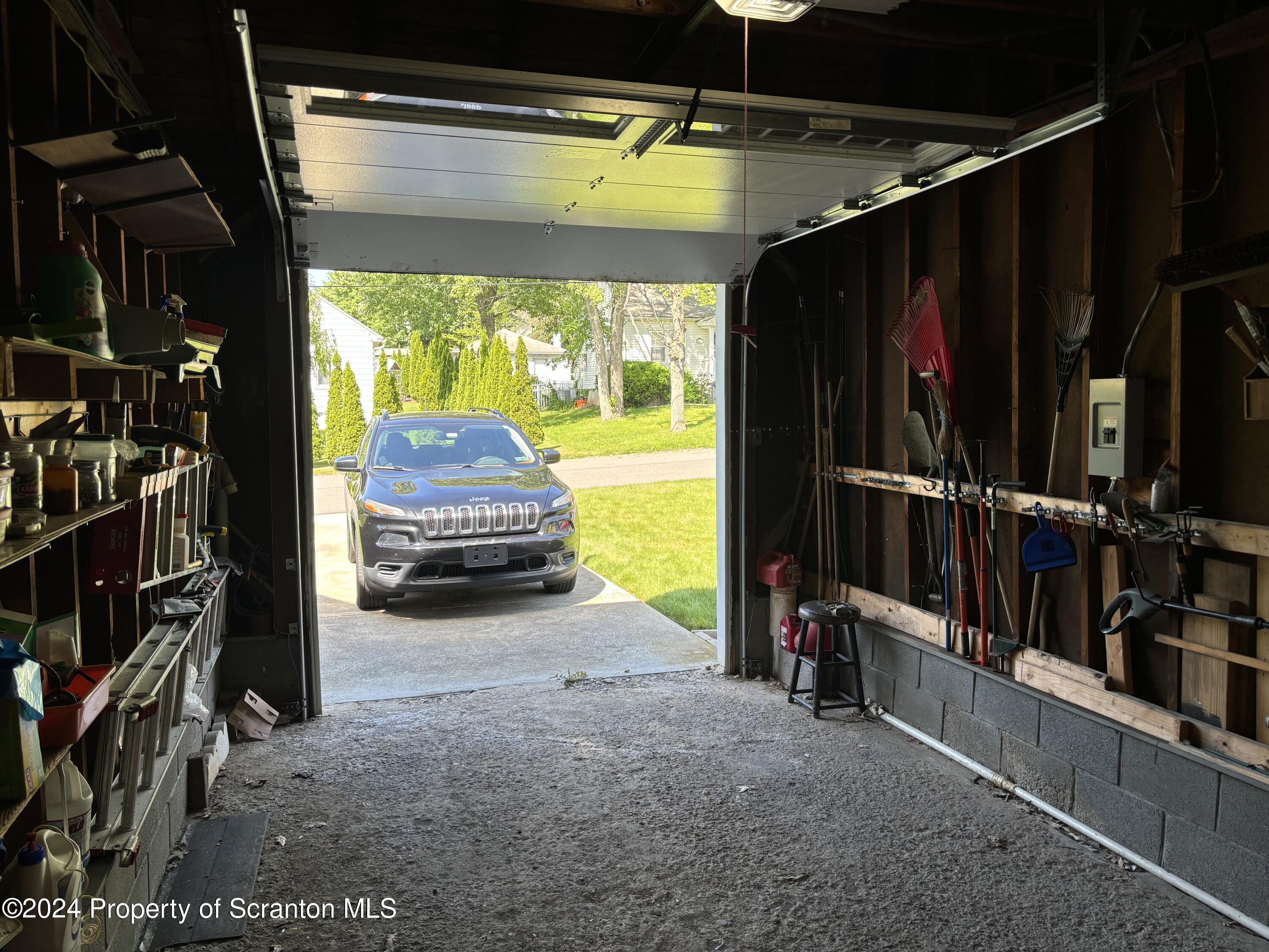 1402 Cherry Street Scranton, PA 18505 - Photo 24 of 25 a view of walk in closet with clothes and shoes