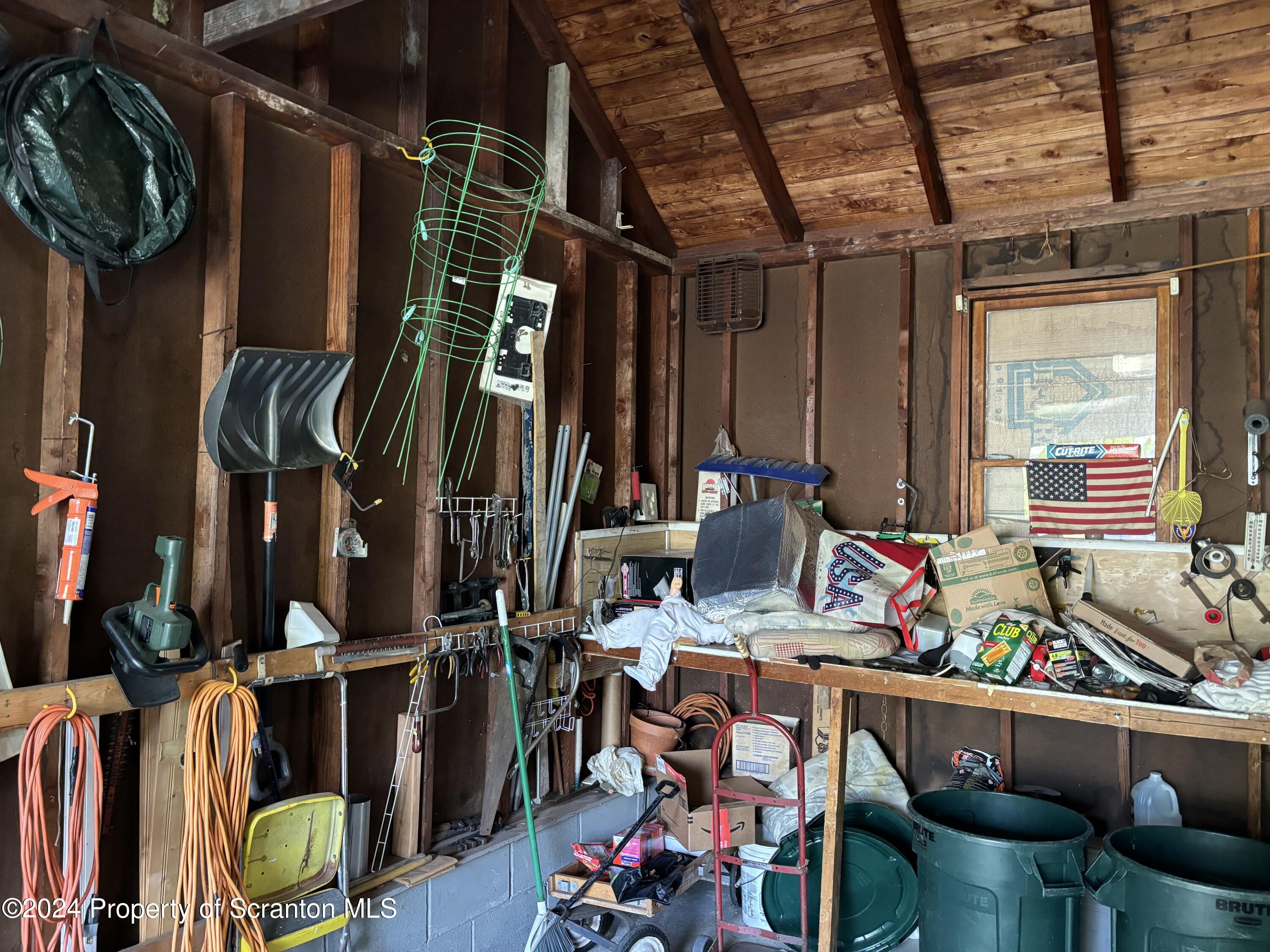 1402 Cherry Street Scranton, PA 18505 - Photo 25 of 25 a view of walk in closet with clothes and shoes