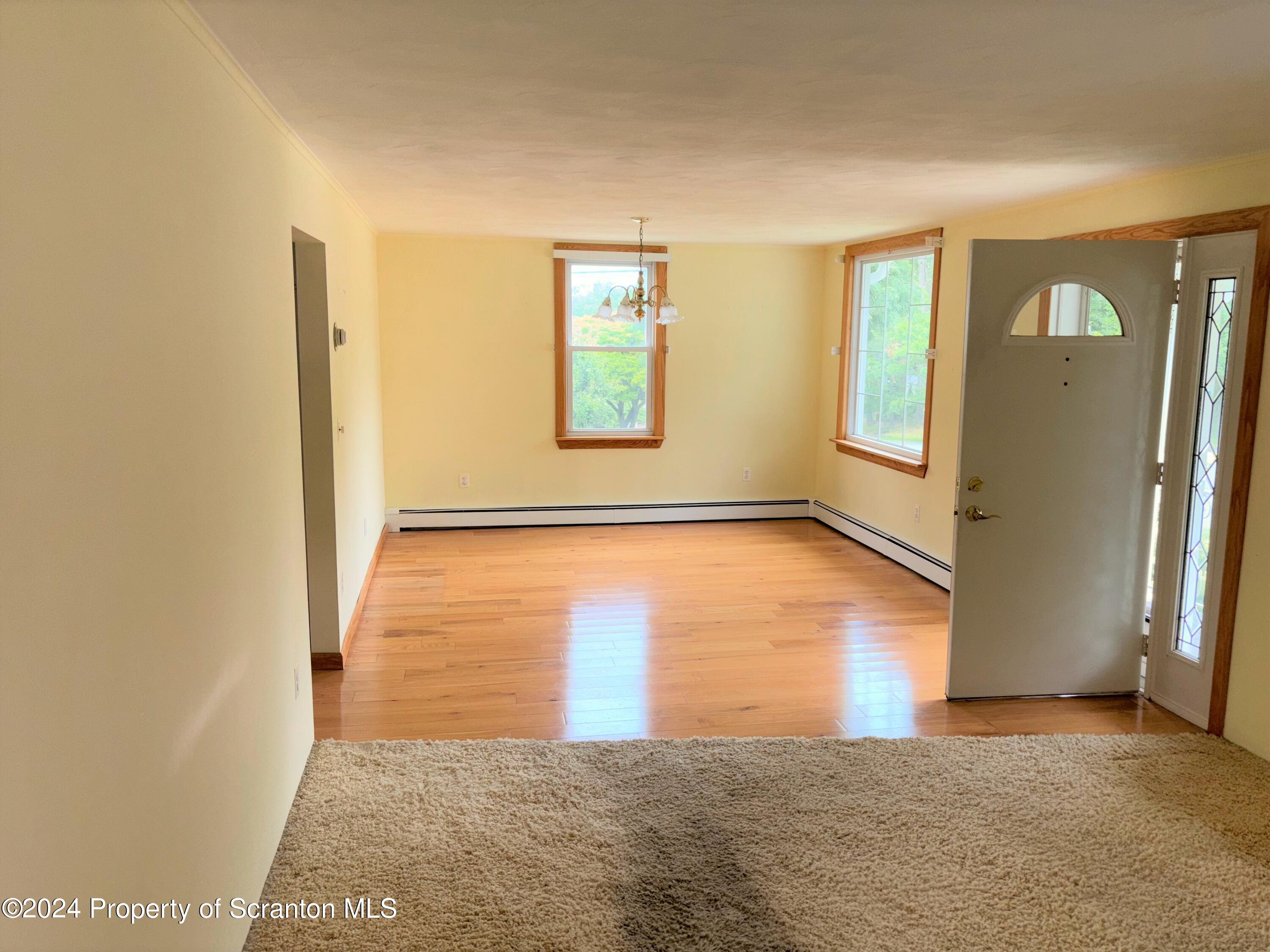 1402 Cherry Street Scranton, PA 18505 - Photo 8 of 25 an empty room with windows