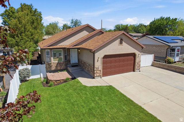 90 Cottage Avenue Sandy, UT 84070 - Photo 1 of 1 Ranch-style house with an attached garage, stucco siding, concrete driveway, and stone siding