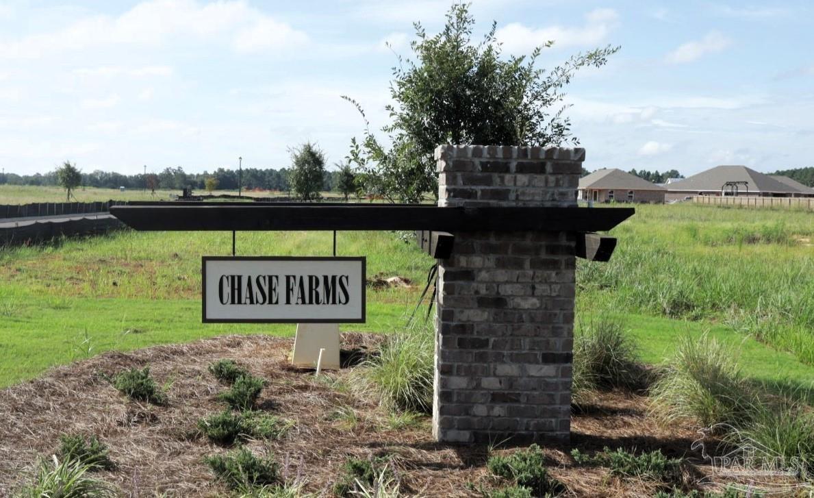 2689 Chevy Circle Pace, FL 32571 - Photo 2 of 26 a sign on the side of the river