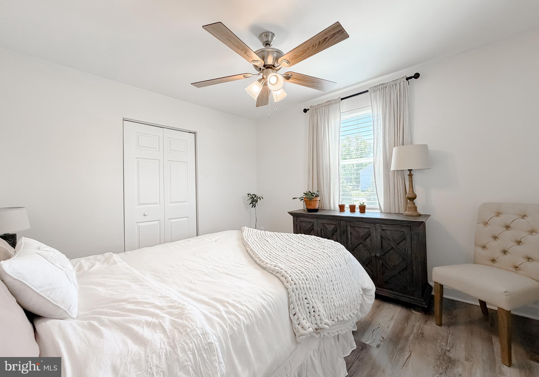 4985 Solomons Island Road Huntingtown, MD 20639 - Photo 19 of 50 a bedroom with a bed and window