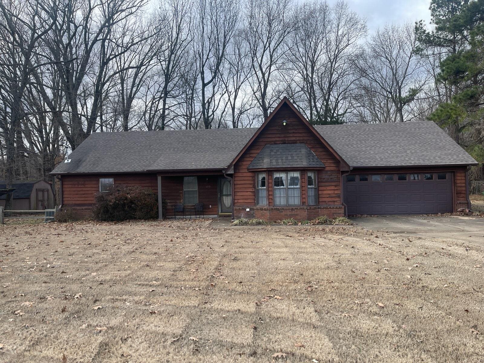 1199 McQuiston Road Brighton, TN 38011 - Photo 1 of 16 Cabin featuring a garage