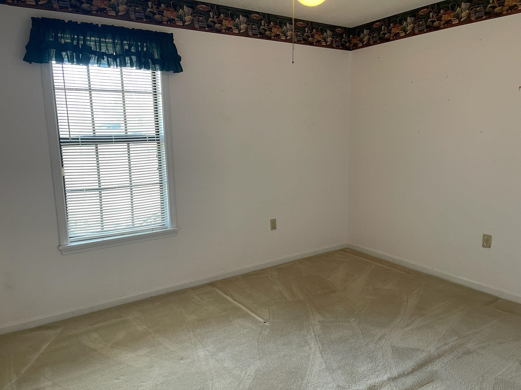 1199 McQuiston Road Brighton, TN 38011 - Photo 14 of 16 Spare room with carpet flooring