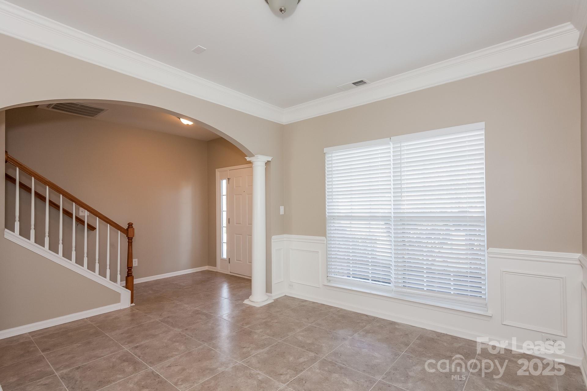 11528 Sidney Crest Avenue Charlotte, NC 28213 - Photo 4 of 15 a view of an empty room with a window