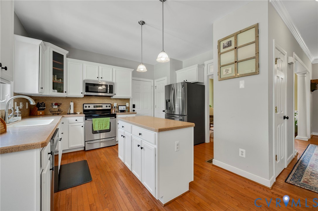 3090 Poor House Road Goochland, VA 23063 - Photo 7 of 32 Spacious kitchen featuring white cabinetry, a cent
