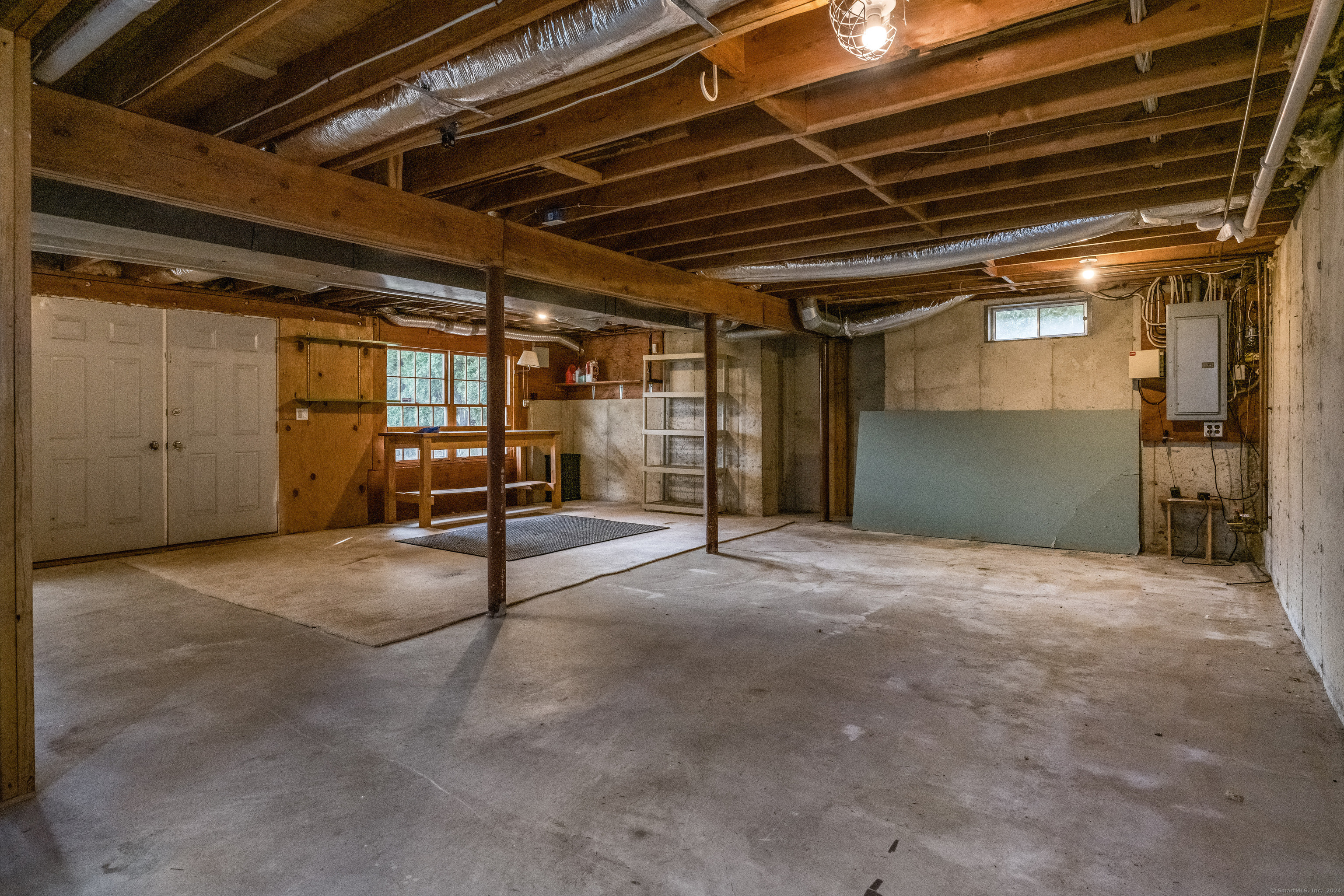 13 Longview Terrace, Unit 13 Madison, CT 06443 - Photo 24 of 31 a view of empty room with wooden ceiling