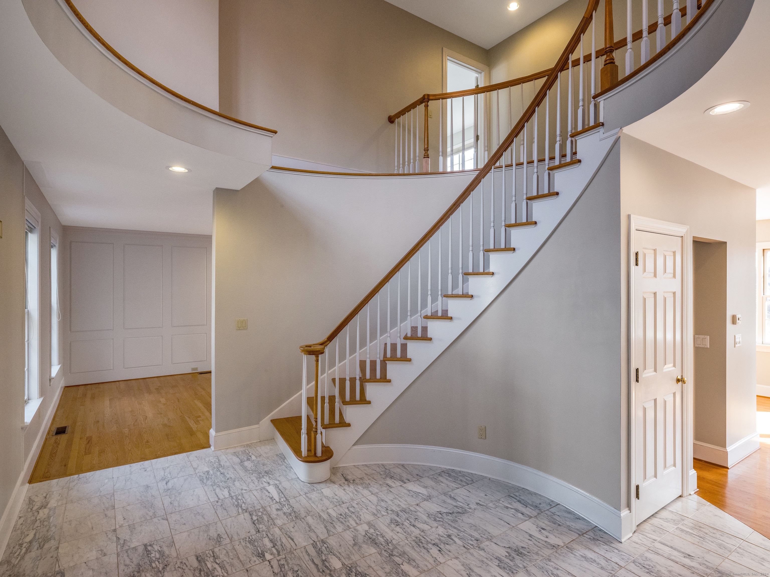 13 Longview Terrace, Unit 13 Madison, CT 06443 - Photo 6 of 31 a view of entryway and hall with wooden floor