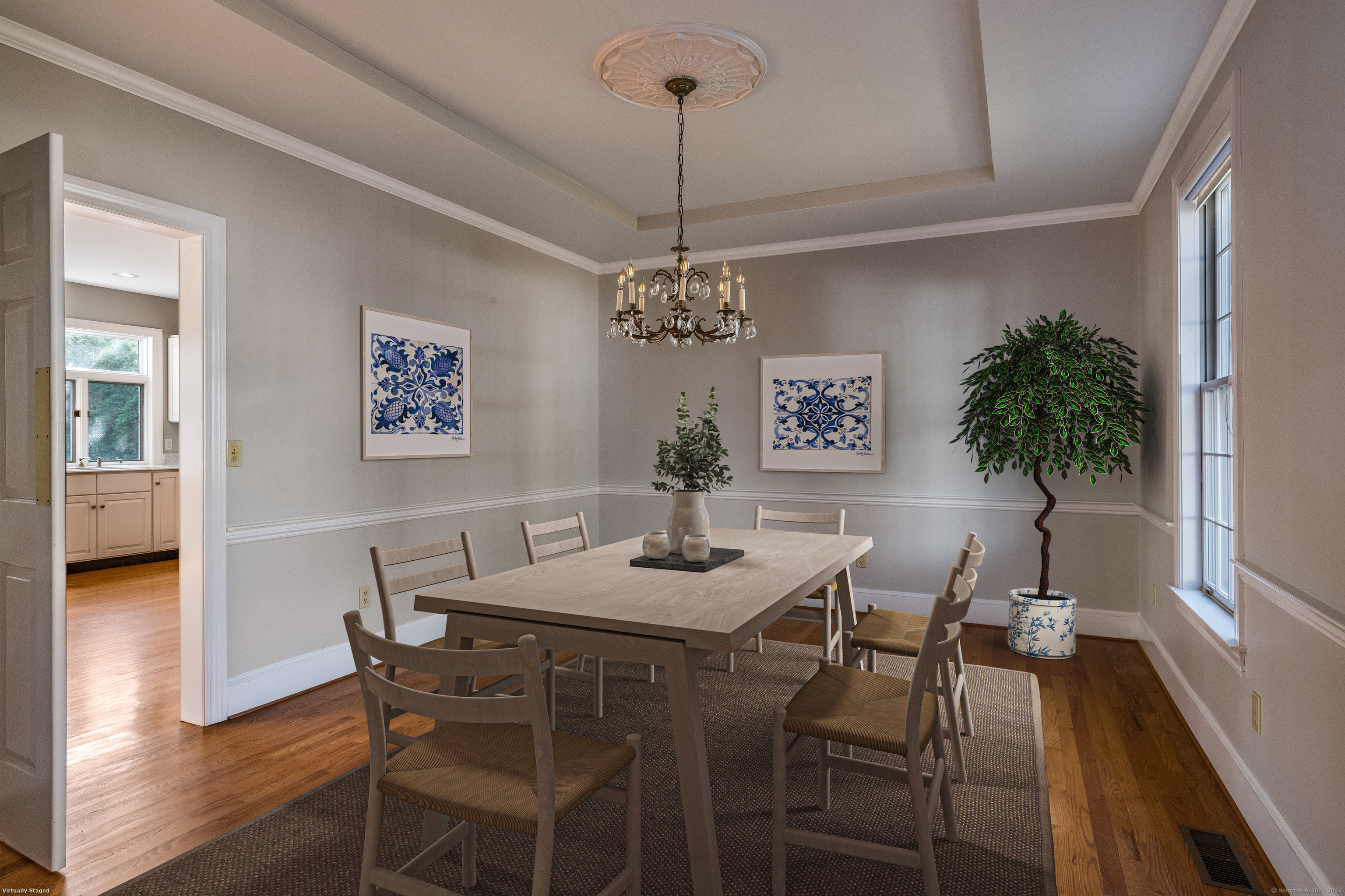 13 Longview Terrace, Unit 13 Madison, CT 06443 - Photo 9 of 31 a view of a dining room with furniture wooden floor and chandelier