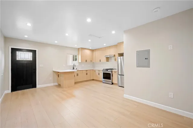 a view of an empty room with a window