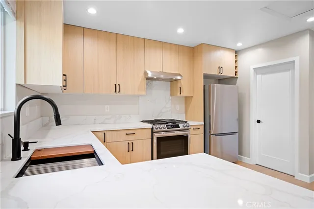 a bathroom with a toilet and a sink