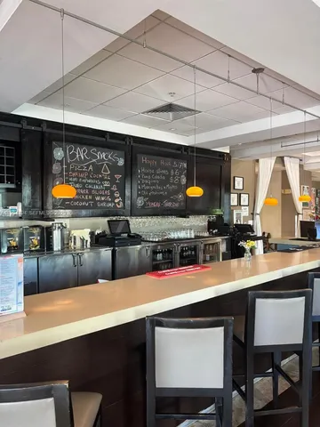 a view of a pathway with a patio