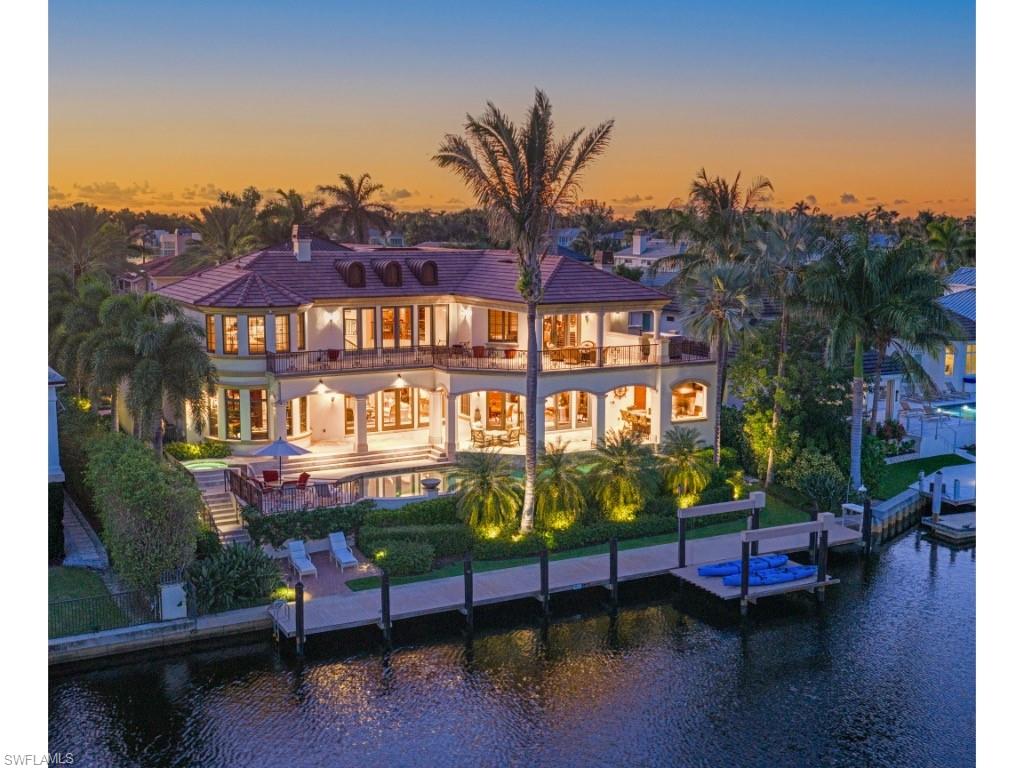 1979 4th Street South Naples, FL 34102 - Photo 20 of 22 a sign on the side of a building