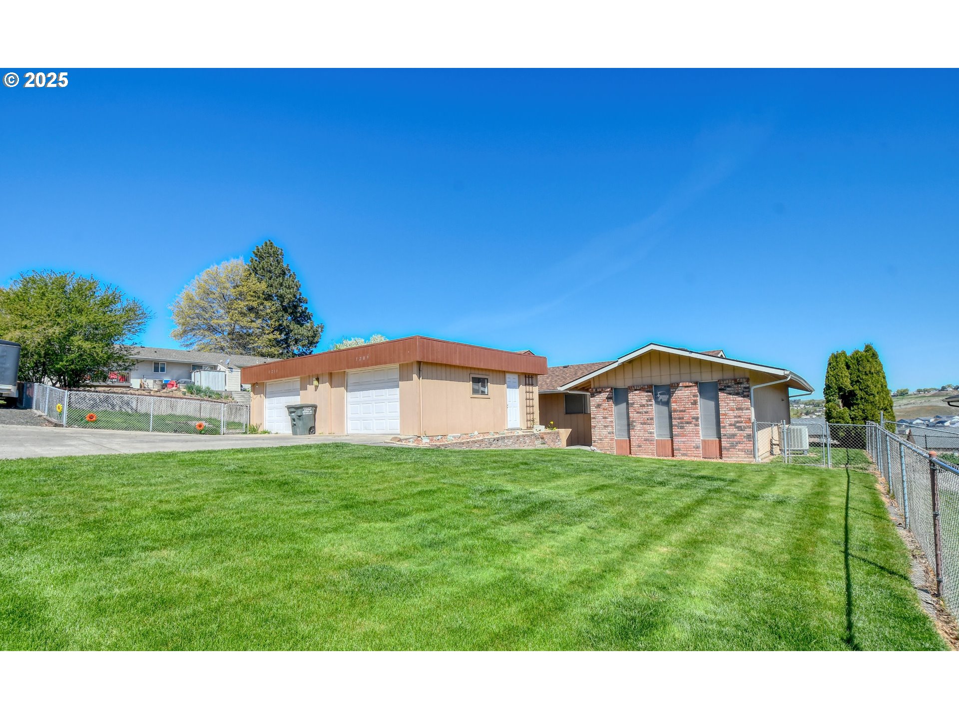 1209 Zeta Court Pendleton, OR 97801 - Photo 2 of 48 a view of a house with a yard