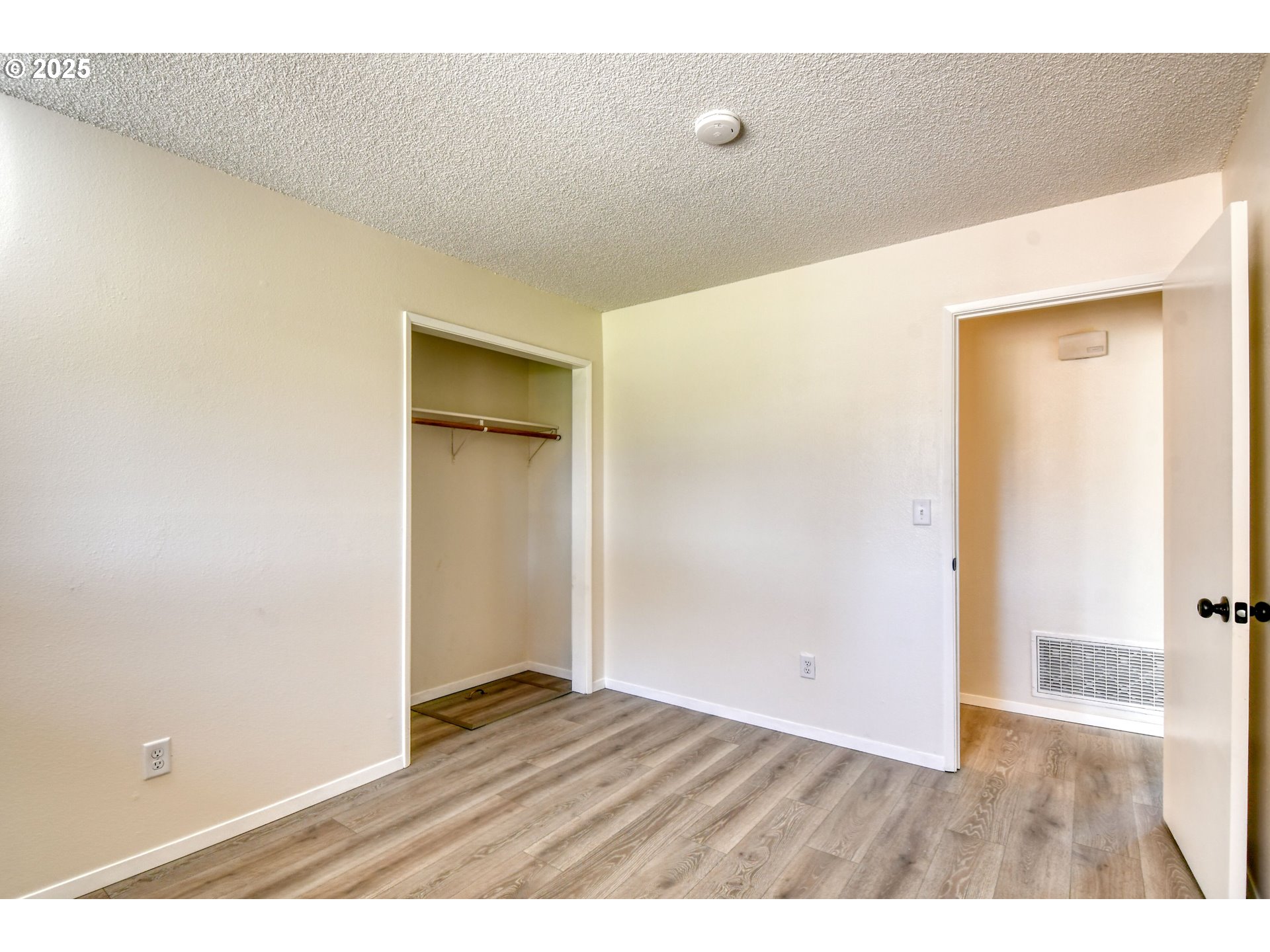 1209 Zeta Court Pendleton, OR 97801 - Photo 37 of 48 a view of an empty room with wooden floor