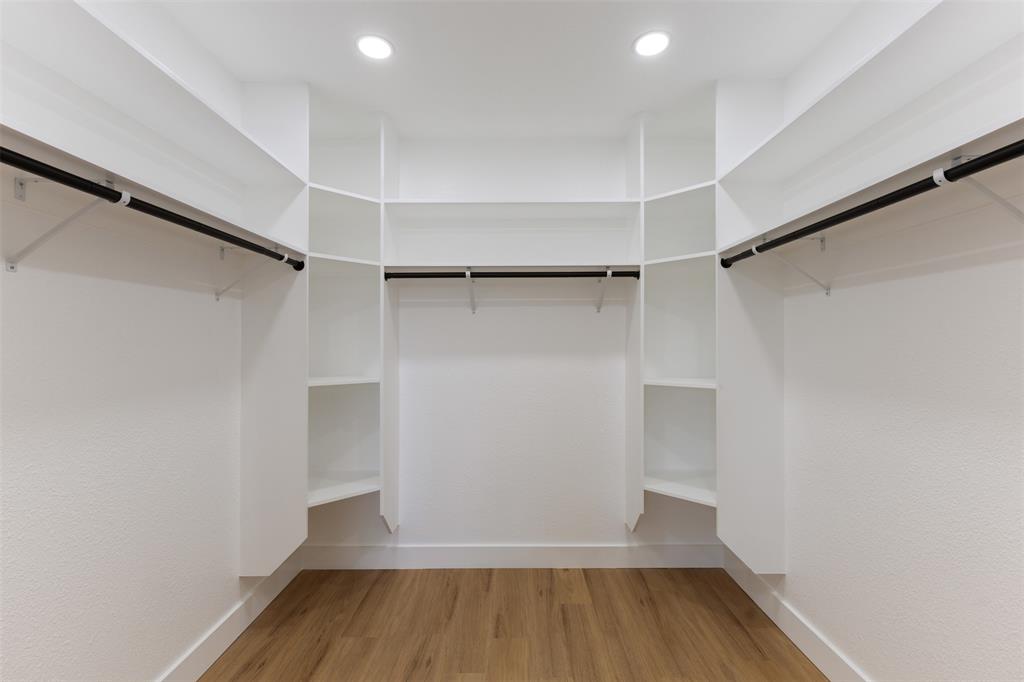 3524 Spring Avenue Dallas, TX 75210 - Photo 20 of 29 Walk in closet featuring light wood finished floors