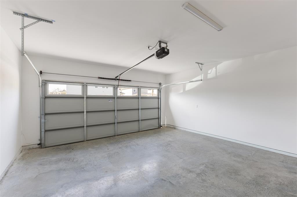 3524 Spring Avenue Dallas, TX 75210 - Photo 26 of 29 Garage with a garage door opener