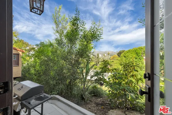 a view of staircase with white walls
